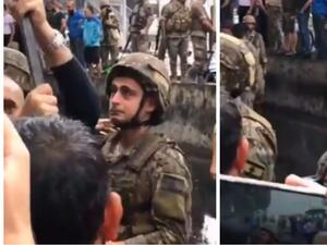 تعاطف مئات المحتجين اللبنانيين مع جندي انهمرت دموعه