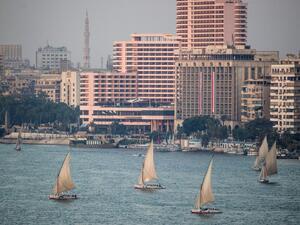 A picture taken on September 30, 2019 shows Egyptian sail boats, known as Feluccas, sailing down the Nile River off central Cairo. (Khaled DESOUKI / AFP)