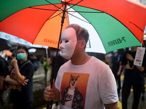 People gather for a rainy protest march in the Causeway Bay shopping district of Hong Kong on October 6, 2019. (AFP/ File Photo)