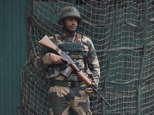Indian Border Security Force (BSF) soldier guards the house of former Jammu and Kashmir chief minister and leader of regional National Conference (NC) Farooq Abdullah (unseen), at his residence in Srinagar on October 6, 2019. (AFP/ File Photo)