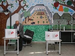 A Tunisian man casts his ballot at a polling station in the capital Tunis on October 6, 2019, during the third round of legislative elections since the North African country's 2011 revolution. (AFP/ File Photo)