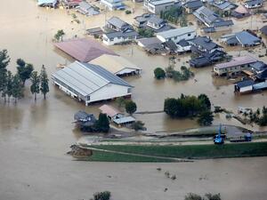 This aerial view shows flooded homes beside the collapsed bank of the Chikuma river in Nagano, Nagano prefecture on October 13, 2019, one day after Typhoon Hagibis swept through central and eastern Japan. (AFP/ File Photo)
