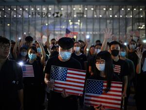 Protesters chant slogans as they attend a rally in Hong Kong on October 14, 2019, calling on US politicians to pass a bill that could alter Washington's relationship with the trading hub. (AFP/ File Photo)