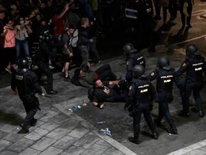 Protester clash with Spanish policemen at El Prat airport in Barcelona on October 14, 2019 as thousands of angry protesters took to the streets after Spain's Supreme Court sentenced nine Catalan separatist leaders to between nine and 13 years in jail for sedition over the failed 2017 independence bid. (AFP/ File Photo)