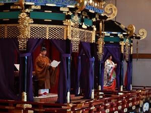 Emperor Naruhito (L) delivers his speech as Empress Masako (R), attends the enthronement ceremony where emperor officially proclaims his ascension to the Chrysanthemum Throne at the Imperial Palace in Tokyo on October 22, 2019. (Kazuhiro NOGI / POOL / AFP)
