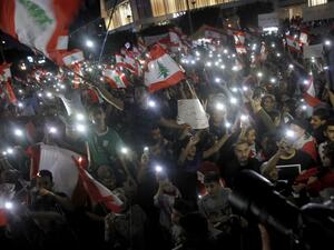Lebanese protestors gather during demonstrations to demand better living conditions and the ouster of a cast of politicians who have monopolised power and influence for decades, on October 22, 2019 in the southern city of Sidon. (AFP/ File Photo)