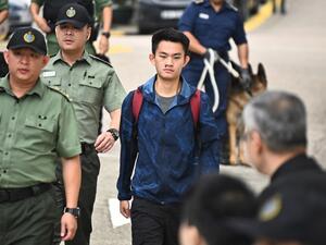 Chan Tong-kai, 20, wanted in Taiwan for the murder of his pregnant girlfriend during a holiday the two Hong Kongers took there in 2018, walks out the Pik Uk Prison in Hong Kong on October 23, 2019, after serving a short jail sentence for stealing his girlfriend's possessions. (AFP/ File Photo)
