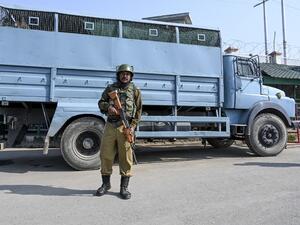 Suspected militants shot dead two non-local drivers and set their apple trucks ablaze in Indian-Administered Kashmir, police said on October 25, the latest attack on the lucrative fruit industry that employs millions. (Tauseef MUSTAFA / AFP)