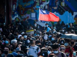 Pro-democracy protesters attend a rally, in the Tsim Sha Tsui area of Kowloon in Hong Kong on October 27, 2019. Police fired tear gas and rubber bullets October 27 at pro-democracy protesters who defied authorities to hold a rally on Hong Kong's scenic harbourfront, the latest flashpoint in months of political unrest gripping the city.  (Anthony WALLACE / AFP)