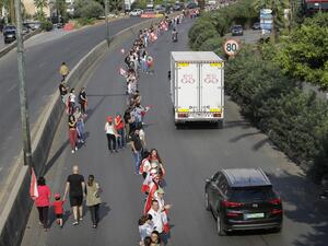Tens of thousands of Lebanese protesters were to attempt a human chain running across the entire country. (AFP/ File Photo)