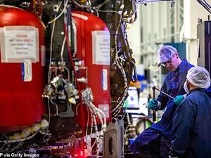 Employees of SpaceX work on the Crew Dragon reusable spacecraft. (AFP/ File Photo)
