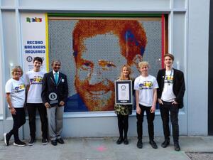 The makers of Rubik's Cube broke a Guinness World Record when 308 people contributed to creating a Rubik's Cube mosaic of Prince Harry's face. (Photo courtesy of Rubik's Brand)