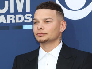 Brown's band confirmed Dixon's death in a statement.