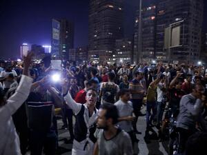 Egyptian protesters shout slogans as they take part in a protest in Cairo’s downtown on Friday calling for the removal of President Abdel Fattah Sisi. (AFP)