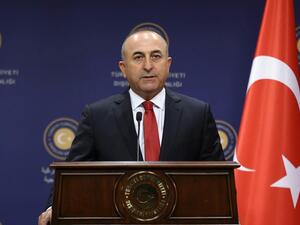 Turkish Foreign Minister Mevlut Cavusoglu gives a press conference in Ankara on July 25. (AFP/ File Photo)