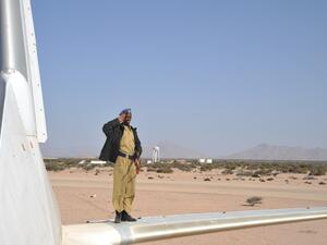 The police officer by crashed plane at the airport of Berbera. (Shutterstock/ File Photo)