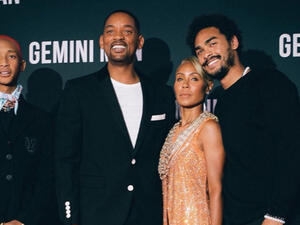 Smith and his sons wore coordinating black ensembles