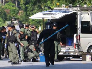 Members of a bomb squad inspect the site of an attack by suspected Muslim militants in Yala province on November 6, 2019. At least fifteen people were killed and another four injured in attacks by suspected Muslim militants in Thailand's violence-wracked south, an army spokesman said on November 6, the largest death toll in years. TUWAEDANIYA MERINGING / AFP