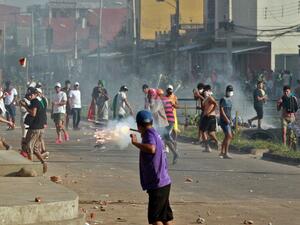 supporters of Bolivian opposition candidate Carlos Mesa and of President Evo Morales clash during a demonstration over disputed poll results, in Santa Cruz, Bolivia. Different countries in Latin America are currently being rocked by political change and upheaval. (DANIEL WALKER / AFP)