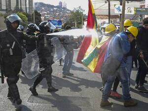 Riot police fire tear gas to disperse people taking part in a blockade to protest against the results of the October 20 elections in La Paz, on November 4, 2019. (AFP/ File Photo)
