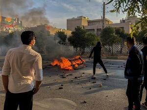 Iranian protesters block a road during a demonstration against an increase in gasoline prices in the central city of Shiraz on November 16, 2019. One person was killed and others injured in protests across Iran. (AFP)