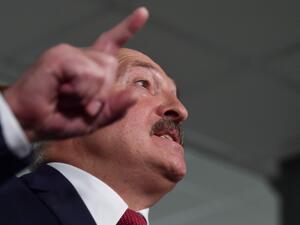 Belarus' President Alexander Lukashenko speaks with journalists as he votes at a polling station during Belarus' parliamentary election in Minsk on November 17, 2019. Sergei GAPON / AFP