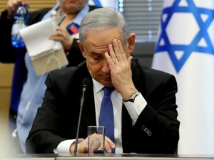 Israeli Prime Minister Benjamin Netanyahu gestures as he speaks during a meeting of the right-wing bloc at the Knesset (Israeli parliament) in Jerusalem on November 20, 2019. GALI TIBBON / AFP