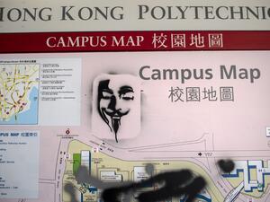 Graffiti showing a depiction of Guy Fawkes is seen on a campus map of the Hong Kong Polytechnic University where dozens of pro-democracy protesters remain holed up, in the Hung Hom district of Hong Kong on November 23, 2019. (AFP/ File Photo)