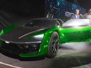 The black and green electric supercar is suitable for all roads. (SPA)