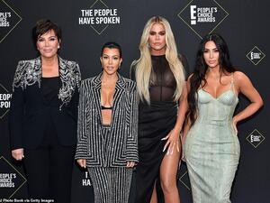 Kim Kardashian West and her sisters Khloe and Kourtney hit the red carpet at the People's Choice Awards
