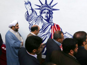 Iran unveils new anti-American murals on the walls of the former US embassy as Tehran prepares to celebrate the 40th anniversary  of the American hostage taking (AFP) 