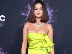 She stunned in a Versace mini dress before wowing the crowd with a performance of her two new singles.