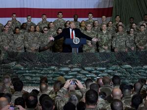 US President Donald Trump speaks to the troops during a surprise Thanksgiving day visit at Bagram Air Field, on November 28, 2019 in Afghanistan. Olivier Douliery / AFP