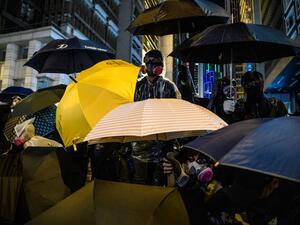 Protesters look on from Pedder Street in Central following a pro-democracy rally from Victoria Park to Chater Road in Hong Kong on December 8, 2019. (AFP/ File Photo)