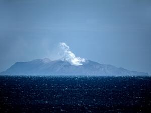 Steam rises from the White Island volcano in Whakatane on December 10, 2019, after a volcanic eruption the day before. New Zealand's Prime Minister Jacinda Ardern expressed "unfathomable grief" on December 10 after a volcanic eruption on a popular tourist island that is thought to have claimed 13 lives. Marty MELVILLE / AFP