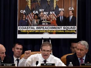 US Representative Jim Jordan (C) (R-OH) delivers opening remarks during the House Judiciary Committee's markup of House Resolution 755, Articles of Impeachment Against President Donald J. Trump on Capitol Hill in Washington, DC, on December 11, 2019. (Olivier Douliery / AFP)