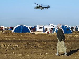  US-led military coalition in Syria over Washukanni camp which was recently established on the outskirts of Hasakeh city for people displaced from the northeastern Syrian town of Ras Al-Ain (AFP)