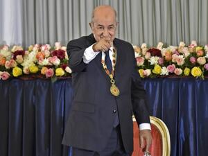 Algerian President Abdelmadjid Tebboune points at the audience during the formal swearing-in ceremony in the capital Algiers  (AFP)
