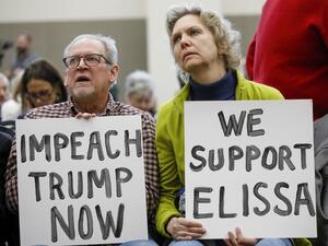 Don Woodward and his wife Carole Zak of Rochester, Michigan wait to listen to U.S. Representative Elissa Slotkin (D-MI) speak at a Town Hall meeting and discuss her decision to vote in favor of the impeachment of President Donald Trump on December 16, 2019 in Rochester, Michigan. (AFP/ File Photo)