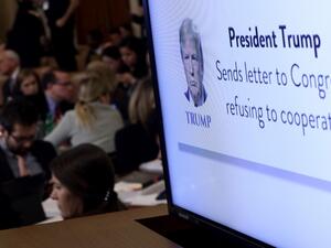 A graphic indicating U.S. President Donald Trump's refusal to cooperate with congressional investigators is shown on a monitor as constitutional scholars Noah Feldman of Harvard University, Pamela Karlan of Stanford University, Michael Gerhardt of the University of North Carolina, and Jonathan Turley of George Washington University testify before the House Judiciary Committee in the Longworth House Office Building on Capitol Hill December 4, 2019 in Washington, DC.  (AFP/ File Photo)