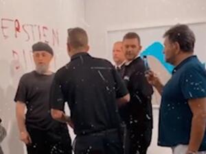 The message was written in red lipstick on the wall after the banana was removed due to crowd safety (dailymail)