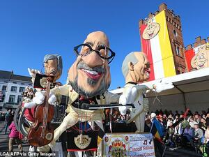 The carnival (pictured), which depicts male characters with crooked, oversized noses holding instruments, has 'turned out to be a bad thing not only for the Jewish community but for the whole of Belgium', according to Belgium's Forum of Jewish Organisations. (AFP)