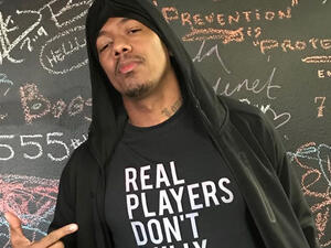 Nick was dressed in a Santa suit that looked a little too big for him.