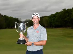 Scott celebrates his triumph