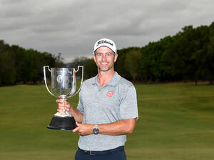 Scott celebrates his triumph