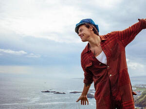 Harry Styles has joked that he could need therapy after shooting to fame with One Direction. 