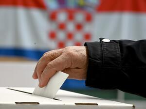 A man casts his ballot at a polling station during the presidential elections on January 5, 2020 in Zagreb, Croatia. Denis LOVROVIC / AFP