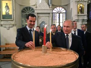 Russian President Vladimir Putin and Syrian President Bashar al-Assad visit the Mariamite Cathedral of Damascus, one of the oldest Greek Orthodox churches in the Syrian capital, in Damascus on January 7, 2020. Putin met his Syrian counterpart Bashar al-Assad during an unprecedented visit to Damascus as the prospect of war between Iran and the United States loomed over the region. Alexey DRUZHININ / SPUTNIK / AFP