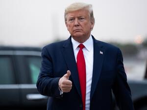 US President Donald Trump disembarks from Air Force One upon arrival at Miami International Airport in Miami, Florida, January 23, 2020, as he travels to speak at the Republican National Committee Winter Meeting. SAUL LOEB / AFP