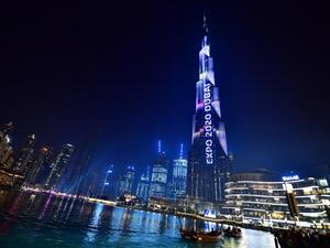 Dubai's Burj Khalifa, world's tallest building, is illuminated during festivities marking countdown to Expo 2020 (AFP)